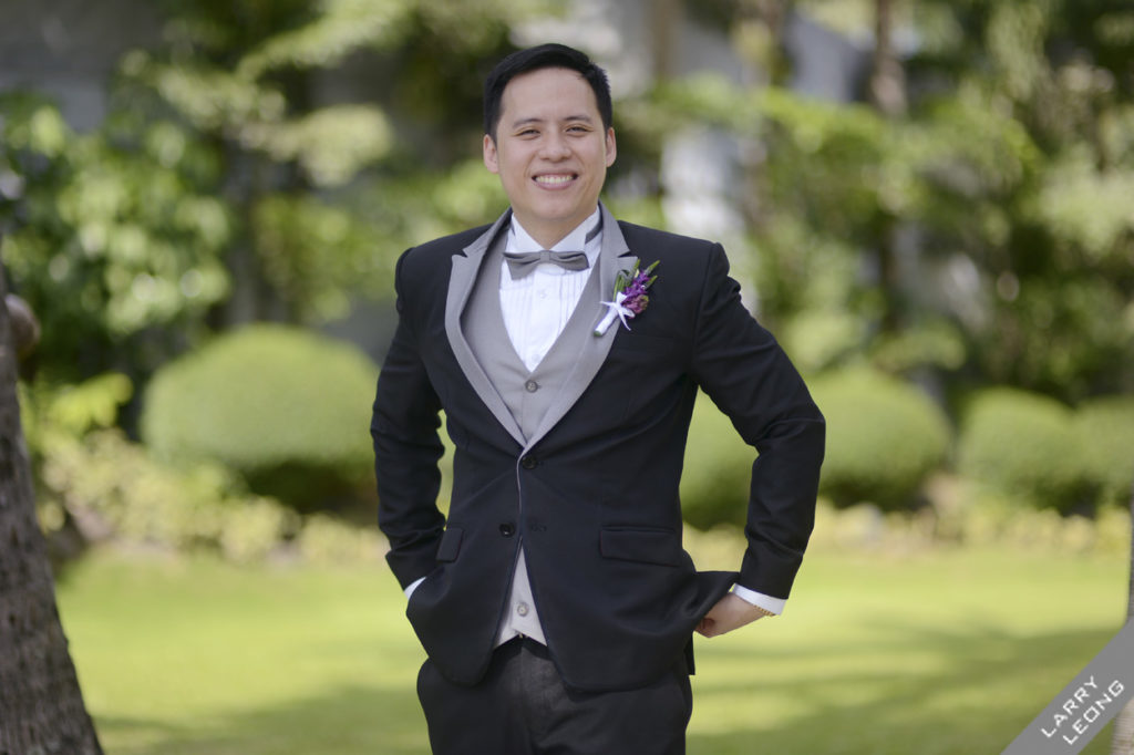 groom suit wedding photographers